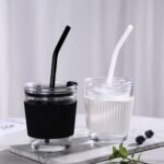BPA free Glass Tumbler Cup With Lid, Straw And Heat Resistant Sleeve For Coffee, Milk, Soda, Juices And Other Hot & Cold Beverages